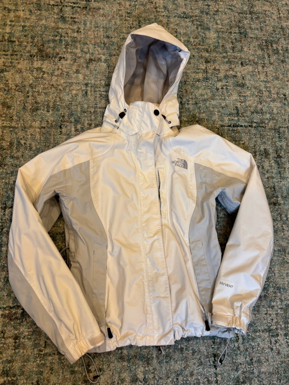 The North Face women’s White Hooded Rain Jacket